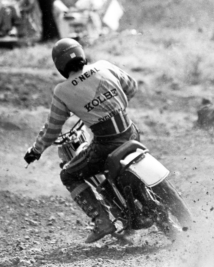Vintage black-and-white photo of a motocross rider in an O'Neal jersey